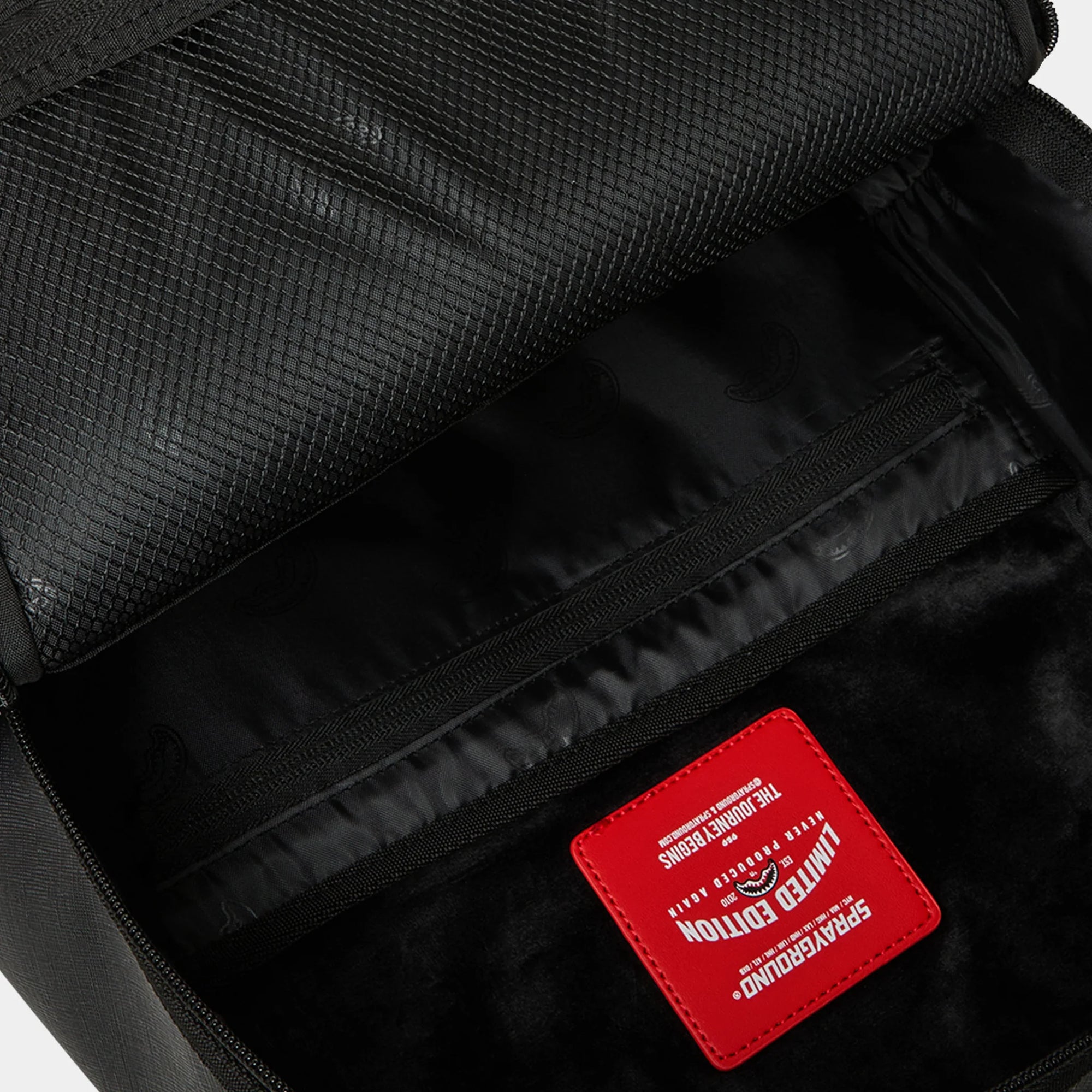 SprayGround Blacked Out Embossed Gold Tooth DLXSV Backpack